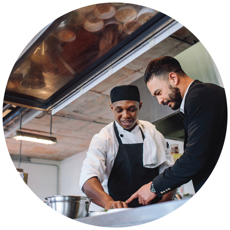 A chef discussing business with a supplier