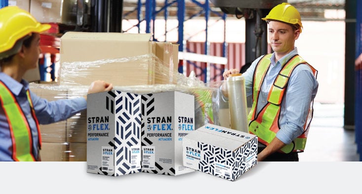 warehouse workers using stretch wrap on shipments