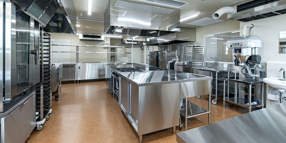 well laid out commercial kitchen with energy efficient appliances